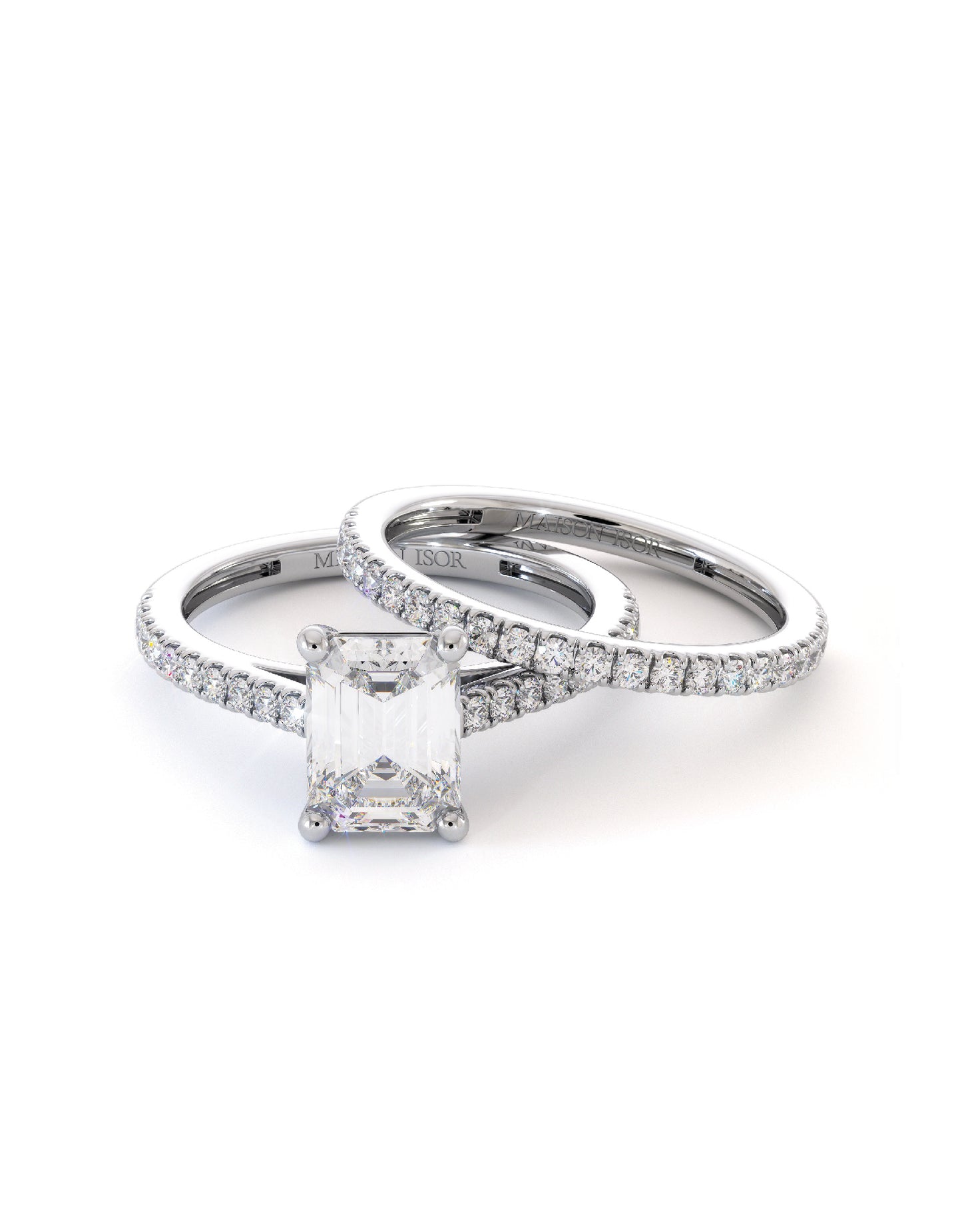 Duo de bagues de fiançailles et alliance en or blanc 18 carats, pierre centrale en taille émeraude