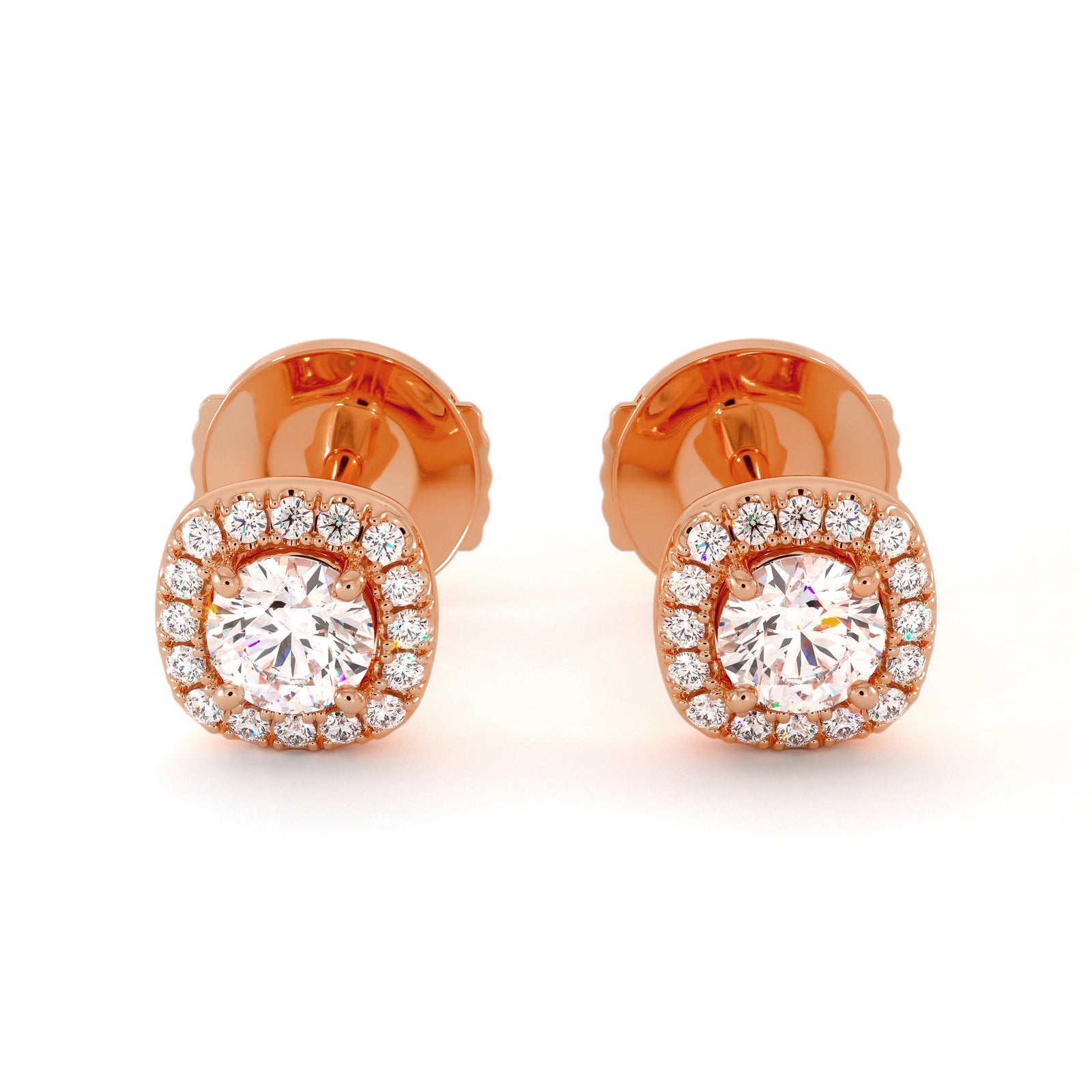 Photo packshot des boucles d'oreilles Pansy en diamants naturels et or rose, forme ronde avec halo.